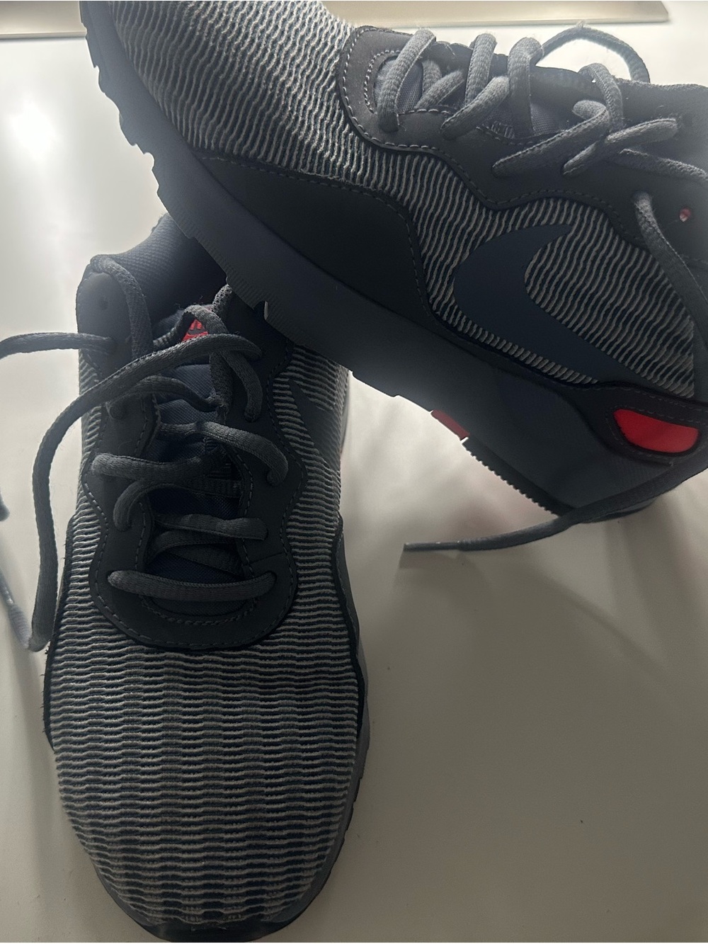 Nike Women's Gray & Black Striped Sneakers with Red Accents